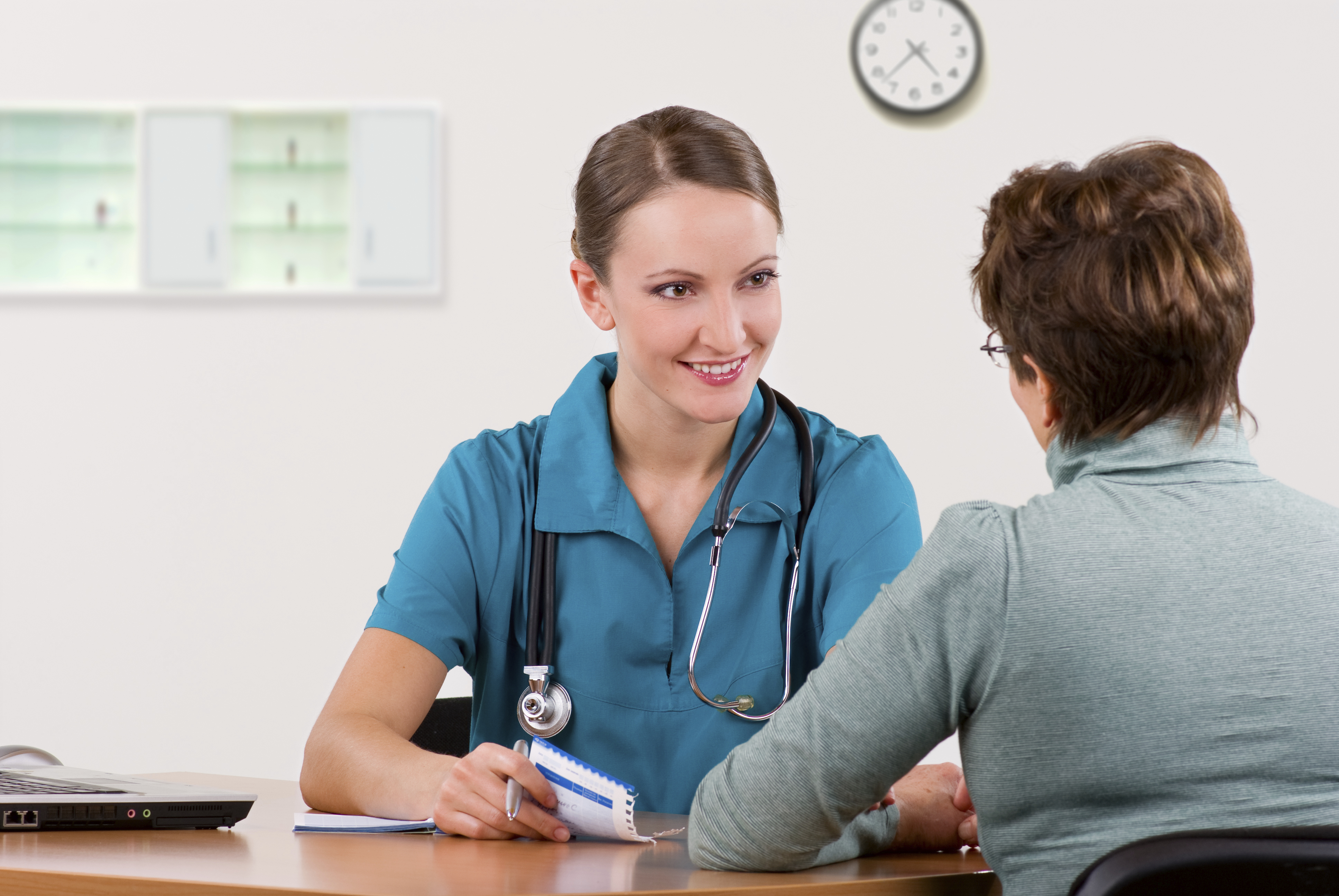 A patient speaking to their health professional